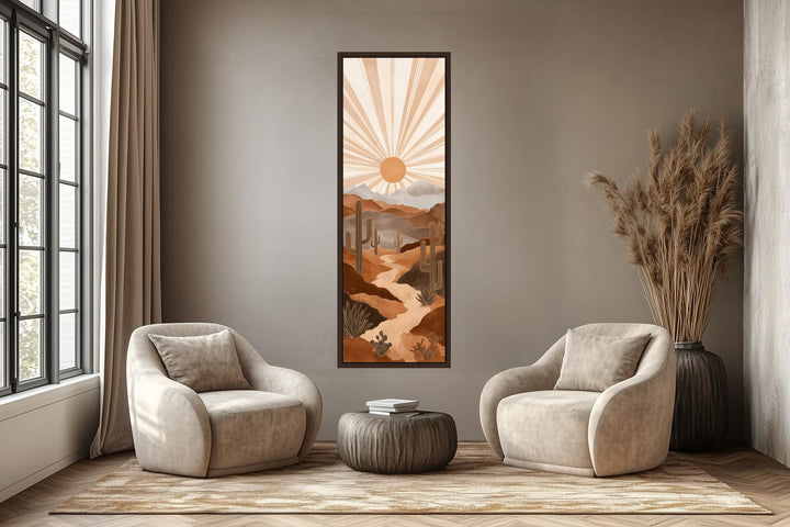 Tall narrow canvas wall art featuring a boho desert landscape with saguaro cacti and a radiant sun.