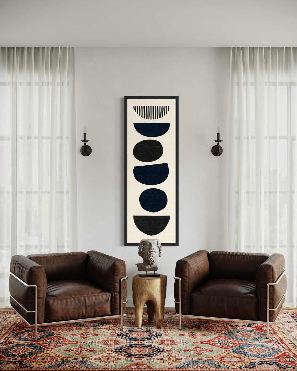 Boho stacked stones tall narrow black and neutral canvas wall art in a modern living room.