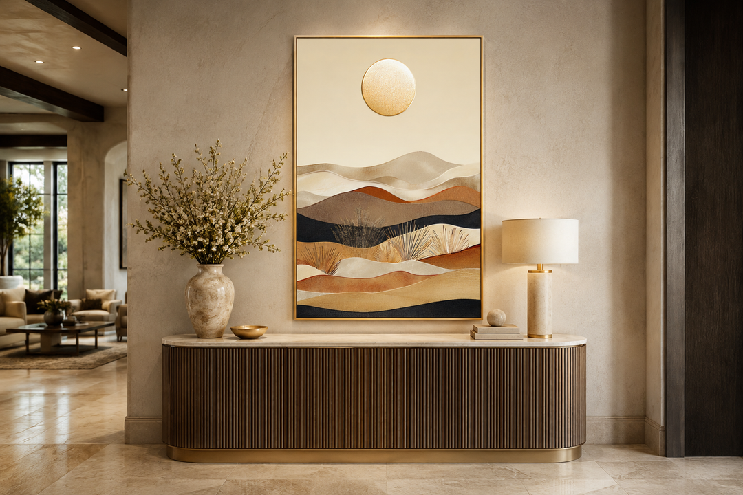 Vertical framed canvas art of a boho desert landscape with sand dunes and a sun in neutral tones.