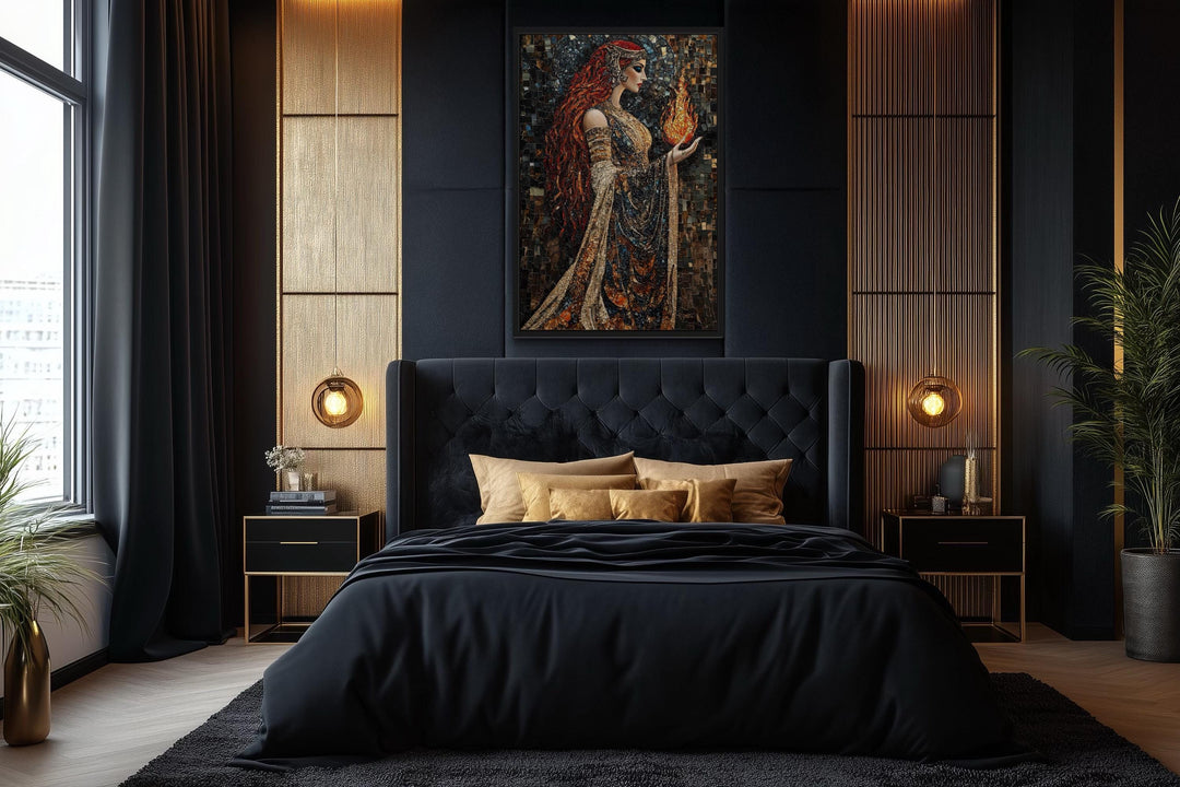 Brigid Celtic Goddess holding fire mosaic painting canvas wall art above a black tufted bed.