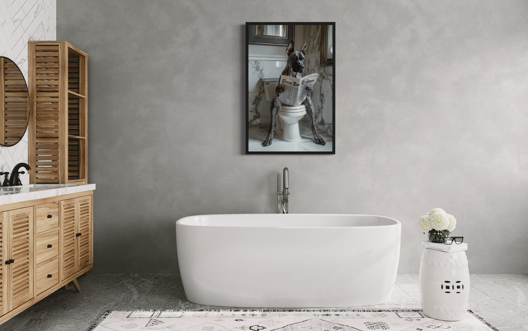 Brindle Great Dane On The Toilet Reading Newspaper Picture above white bath tub sitting next to a wooden cabinet