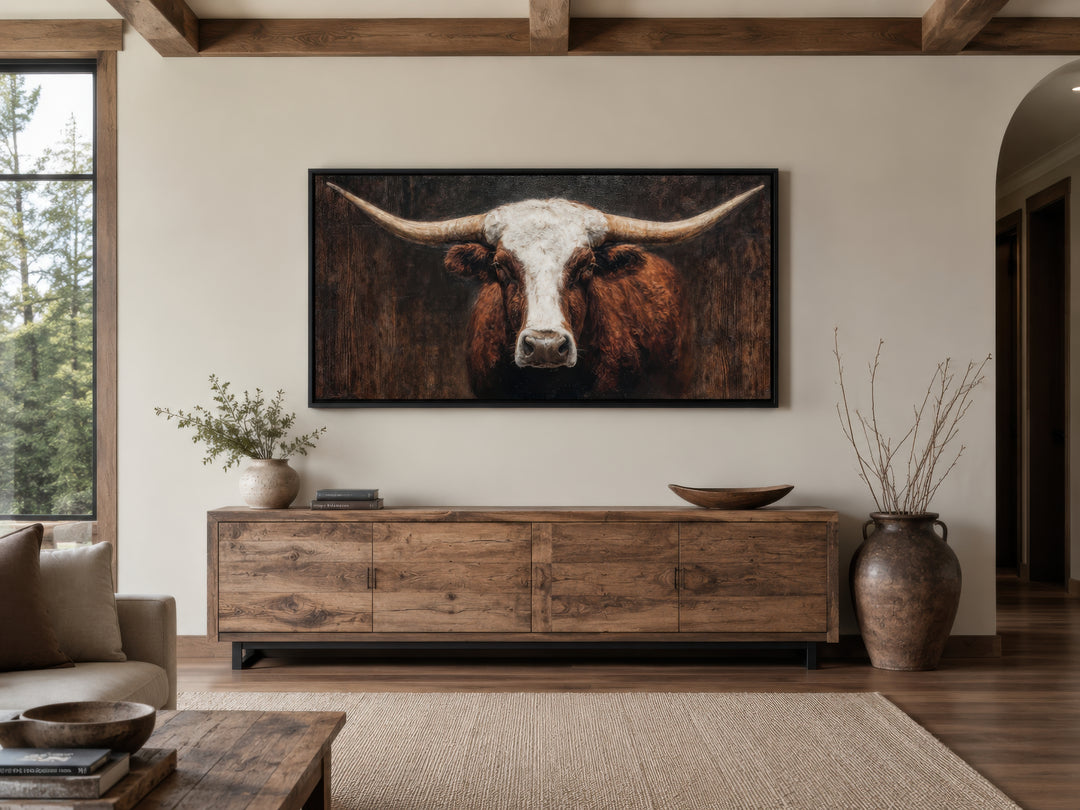 Extra large canvas wall art featuring a close-up of a brown and white Texas longhorn bull.