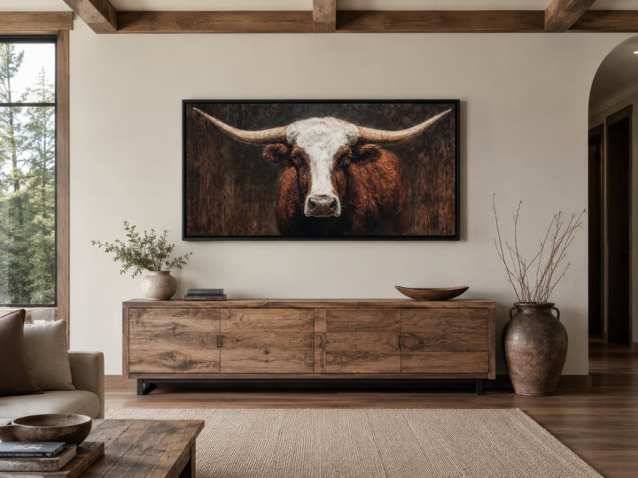 Extra large canvas wall art featuring a close-up of a brown and white Texas longhorn bull.