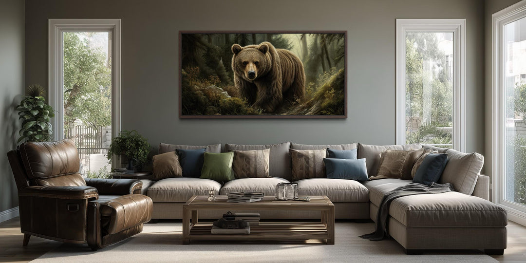 A large canvas print of a brown bear in a forest hangs above a modern sofa in a rustic living room.