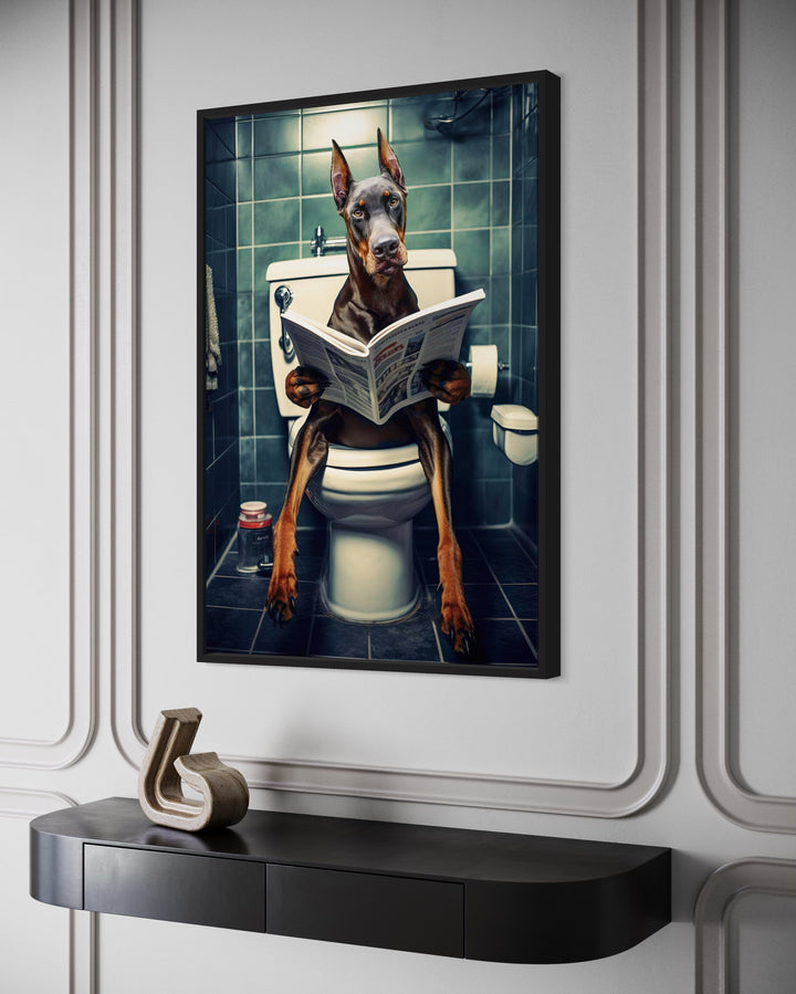 Brown Dobermann Dog On The Toilet Reading Newspaper Picture