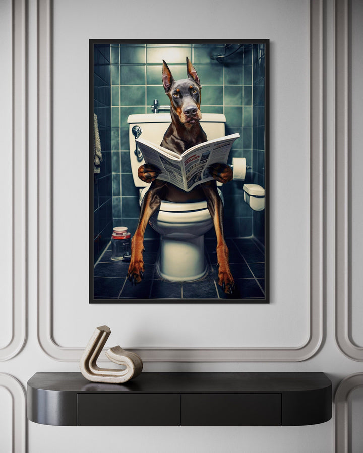 Brown Dobermann Dog On The Toilet Reading Newspaper Picture