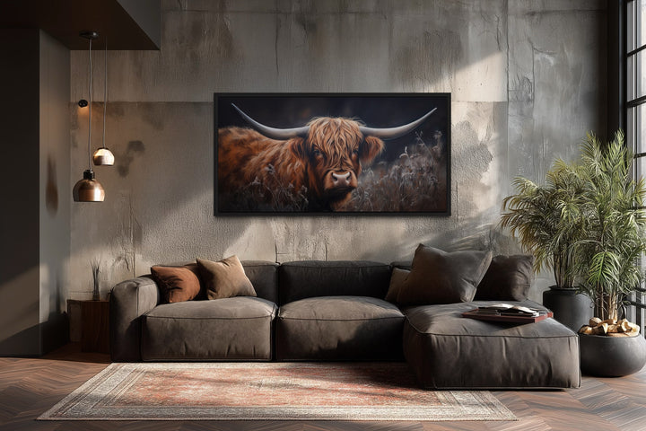 Brown Highland Cow In Grass On Dark Background Framed Canvas Wall Art