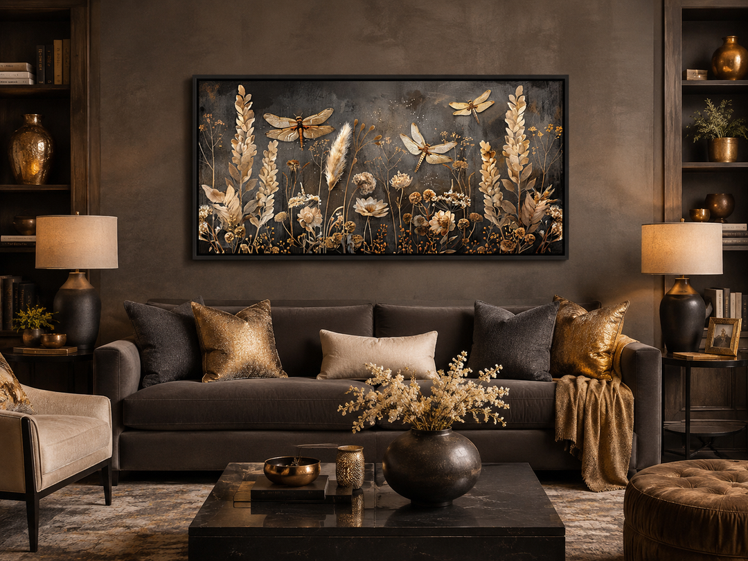 Boho wall art with dragonflies and grass on a brown and beige framed canvas in a living room.
