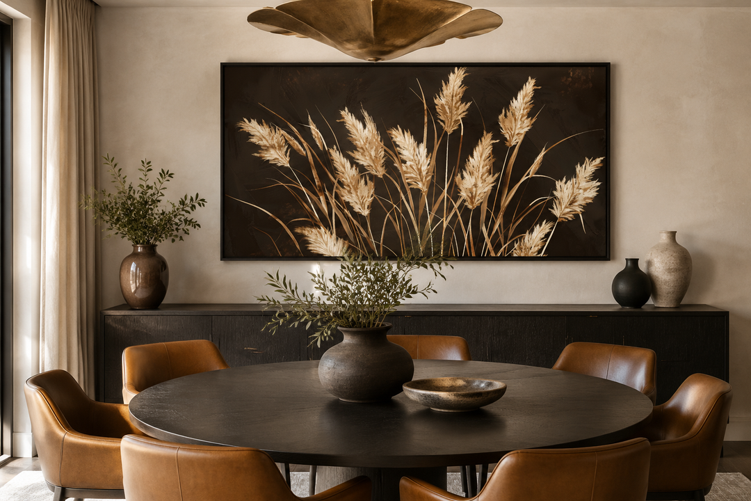 Boho framed canvas wall art featuring beige grass on a dark brown background in a dining room.