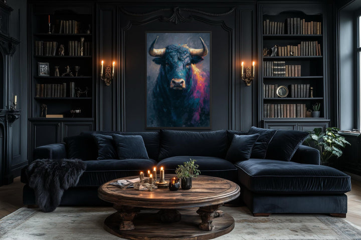 A modern bull painting canvas with bold colors hangs in a dark, sophisticated living room.