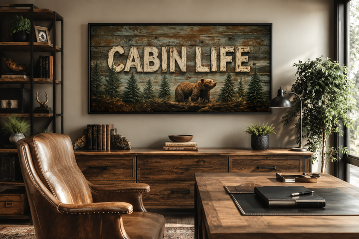 Cabin Life framed canvas wall art featuring a bear and fir trees on a rustic wood-style background.