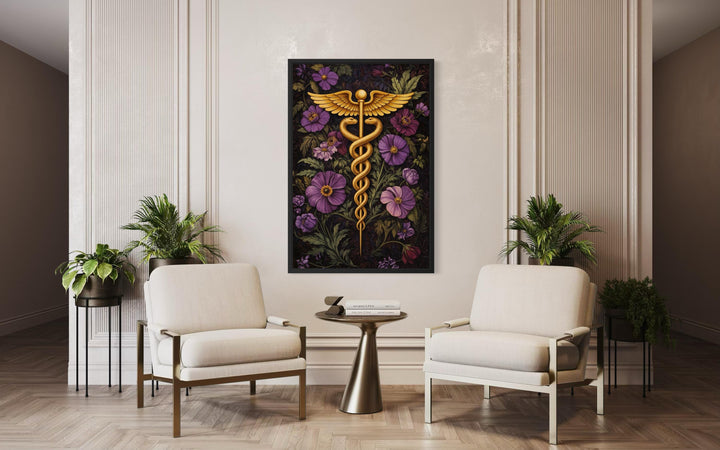 A framed vertical canvas print of a golden caduceus symbol surrounded by purple floral blooms.