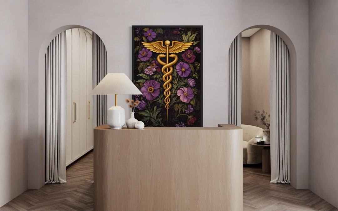 medical office wall decor - A vertical canvas print of a golden caduceus symbol surrounded by purple flowers in a modern office.