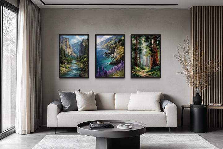 Set of 3 vertical paintings of Yosemite, Big Sur, and Redwood Forest above a modern sofa.