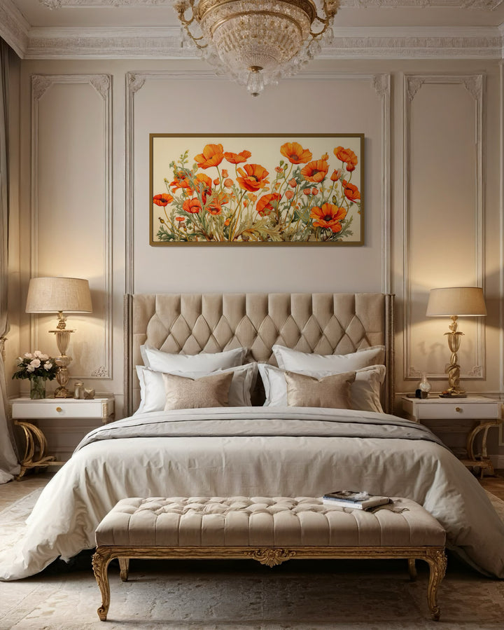California Poppies Framed Canvas Wall Art featuring orange flowers above a tufted beige bed.