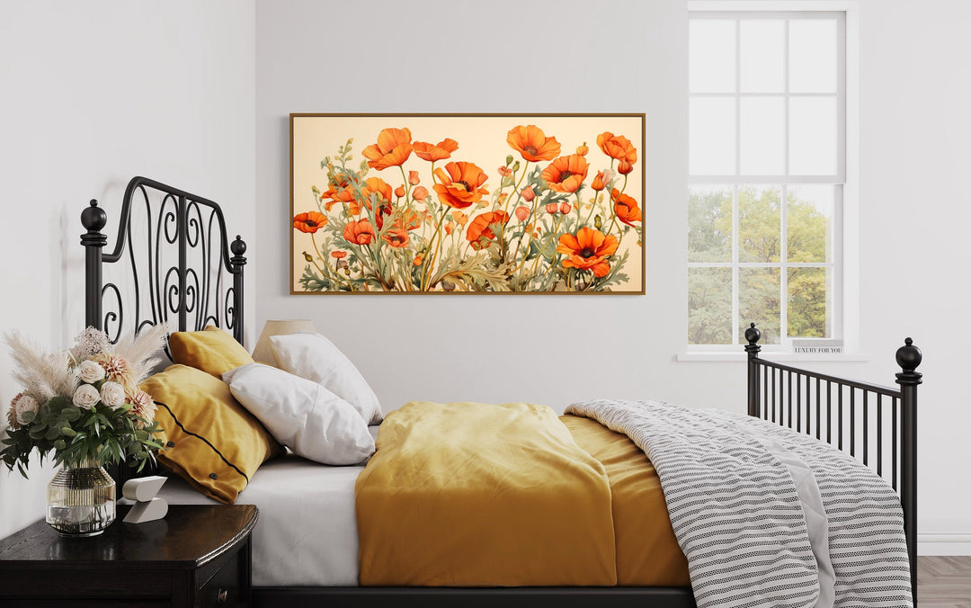 California Poppies Framed Canvas Wall Art hanging above a bed with yellow and white pillows.