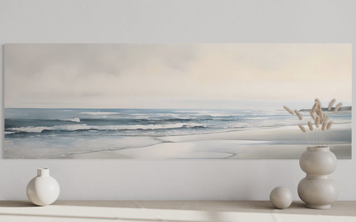 Minimalist long horizontal coastal framed canvas wall art featuring a serene beach landscape.