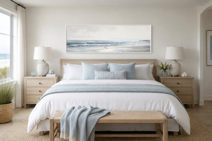 Long horizontal framed canvas wall art featuring a minimalist coastal beach landscape.