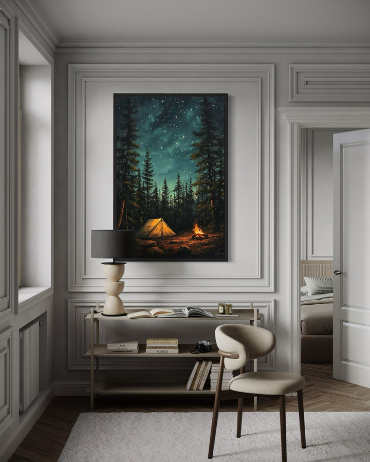 Framed canvas wall art of a glowing campfire and tent in a pine forest under a starry night sky.