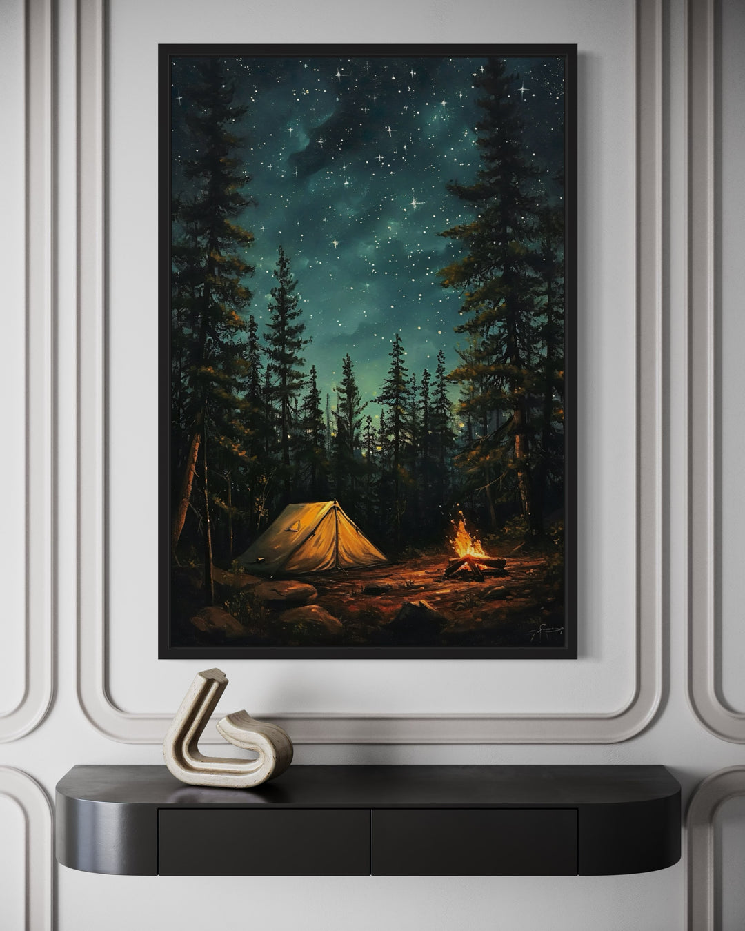 Framed canvas art of a glowing campfire and tent in a pine forest under a starry night sky.