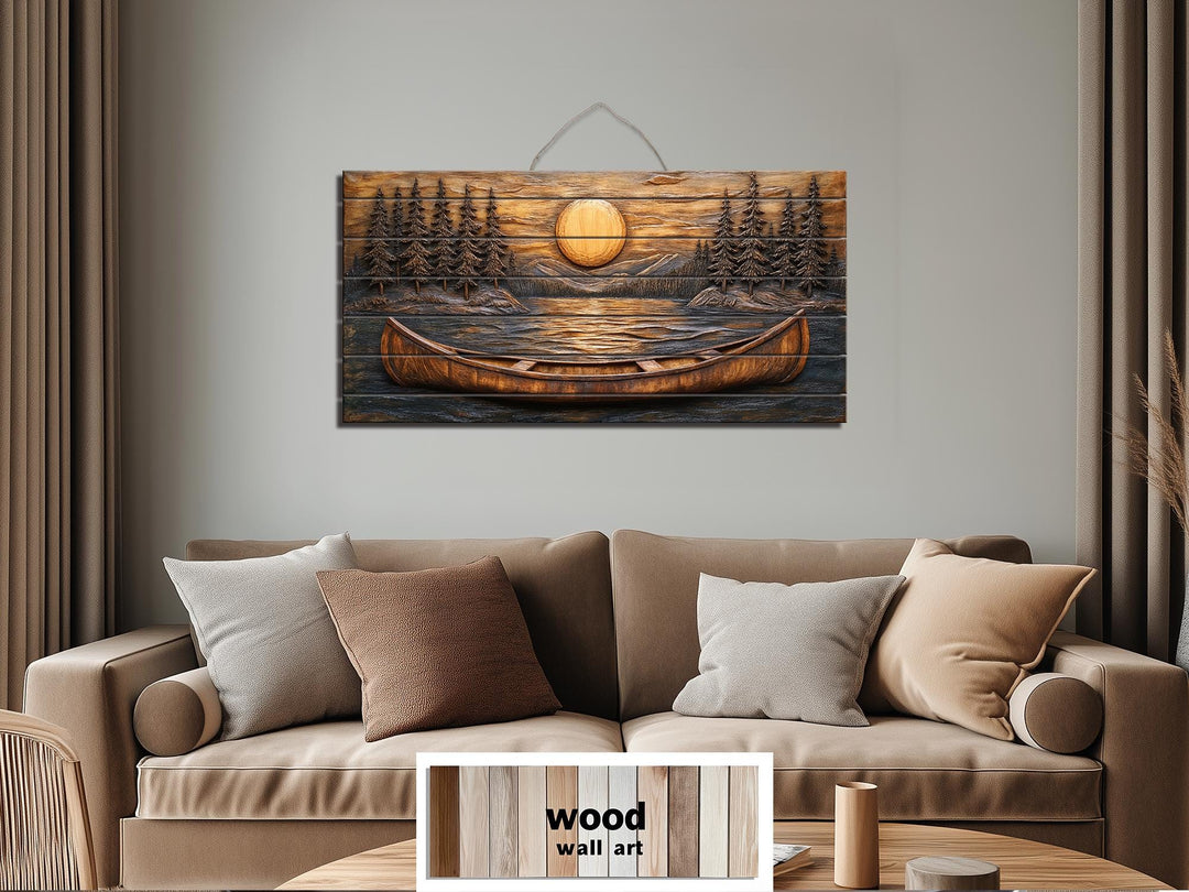 Canoe in the lake at sunset wood wall art hanging above a sofa in a rustic living room.