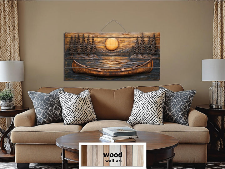 Canoe in the lake at sunset wood wall art displayed above a sofa in a rustic living room.