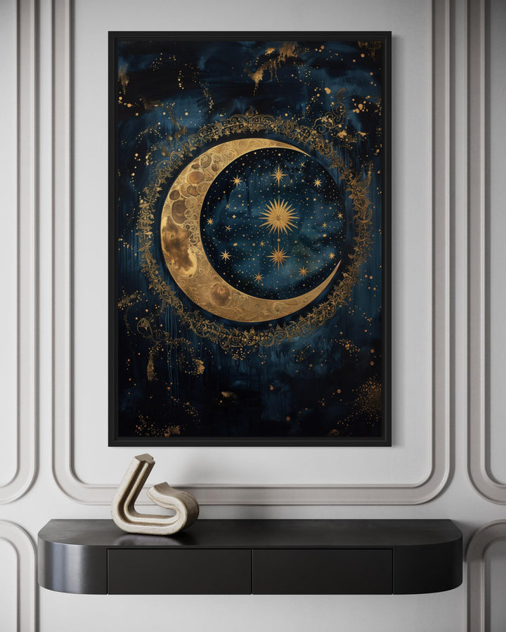 Celestial Moon and Stars Gothic Canvas Wall Art in a black frame above a dark console table.