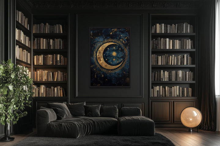 Celestial Moon and Stars Gothic Canvas Wall Art in a dark library with a black sofa and bookshelves.