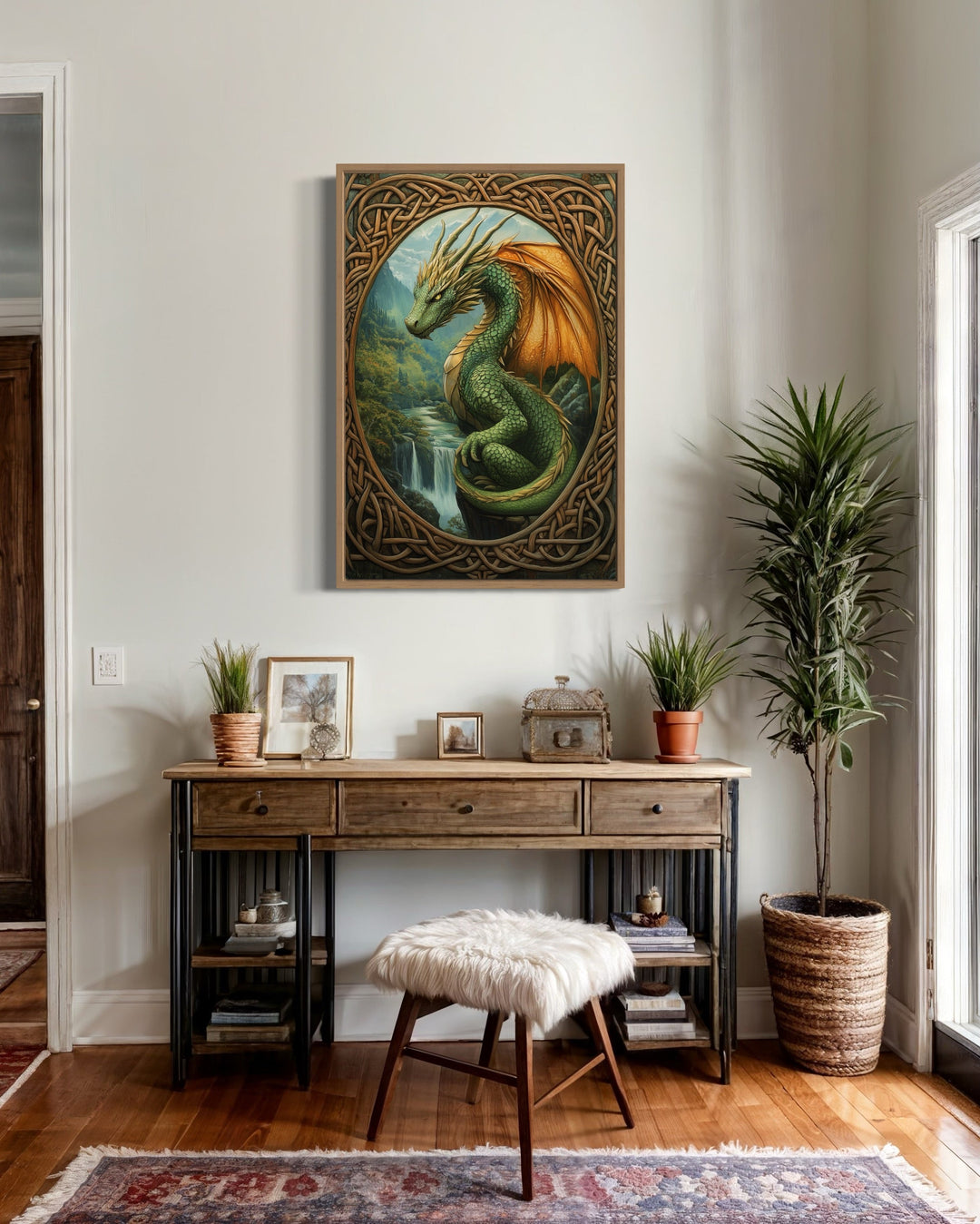 Celtic dragon perched over a waterfall in a green mountain valley canvas wall art above a desk.