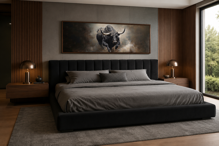 Charging bull long horizontal canvas wall art above a bed in a modern masculine bedroom.
