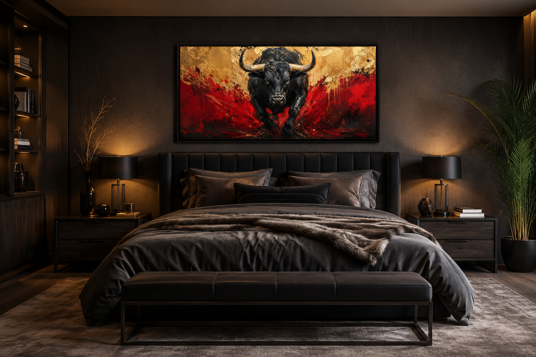 Framed canvas wall art of a charging black bull with red and gold abstract background in a bedroom.