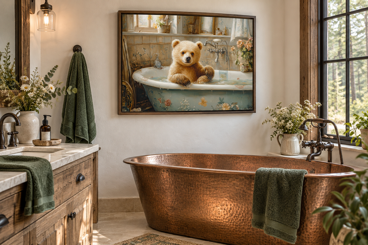 Baby Bear in a Bathtub Framed Canvas Wall Art hanging in a rustic bathroom above a copper tub.