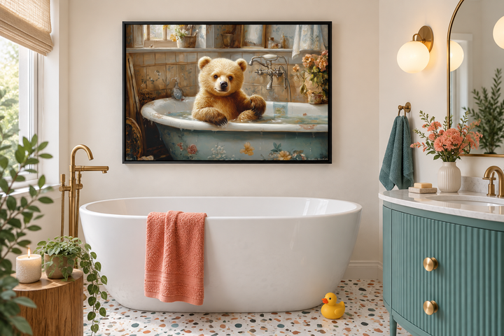 Framed canvas wall art of a baby bear in a vintage bathtub, hanging in a modern bathroom.