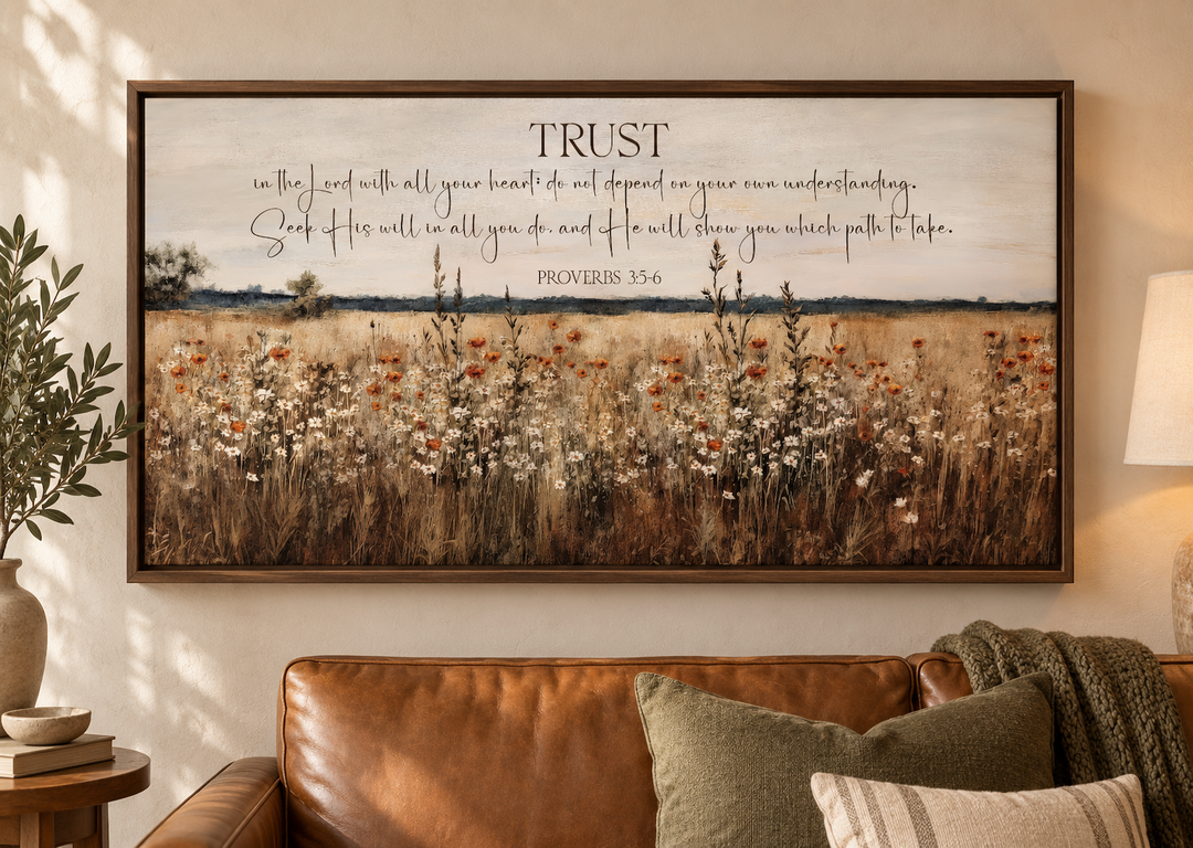 Bible verse wall art with Proverbs 3:5-6 over a golden wildflower field in a brown frame.