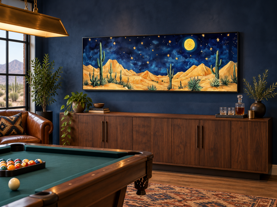 Southwestern desert night sky long horizontal framed canvas wall art above a wooden sideboard.