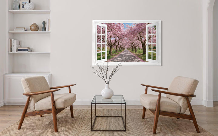 A canvas wall art piece depicting a cherry blossom path through an open white window frame.