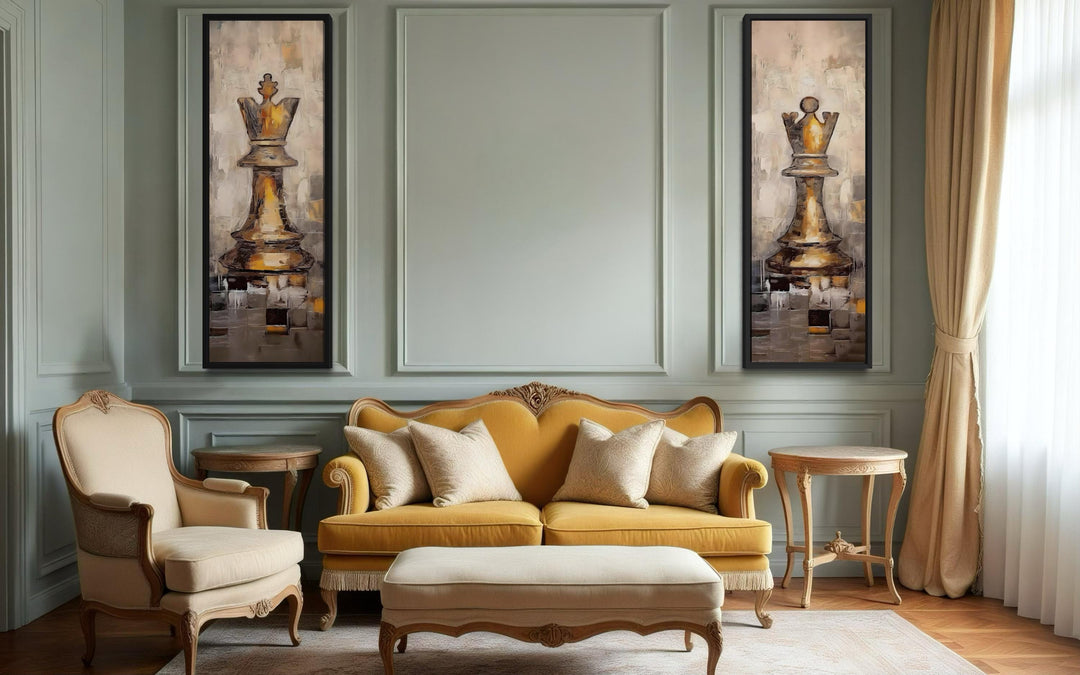 Two tall narrow canvas prints of a golden chess king and queen flanking a central wall panel.