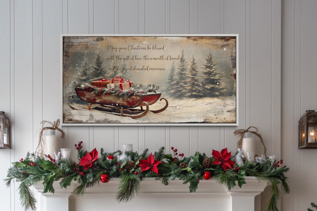 Framed canvas wall art of Santa's sleigh with gifts and a Christmas blessing above a mantel.