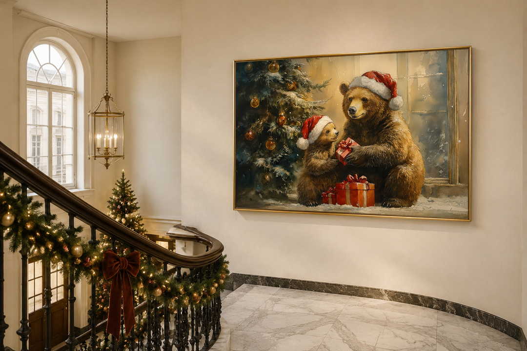 Framed wall art of a mama bear and cub in Santa hats exchanging gifts by a Christmas tree.