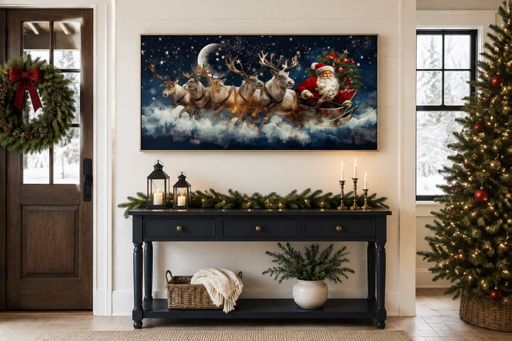 Santa Claus in a sleigh pulled by reindeer canvas wall art displayed above a black console table.