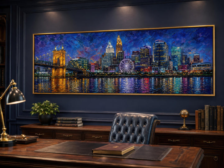Panoramic Cincinnati skyline canvas art in a dark wood office with a leather chair and desk.