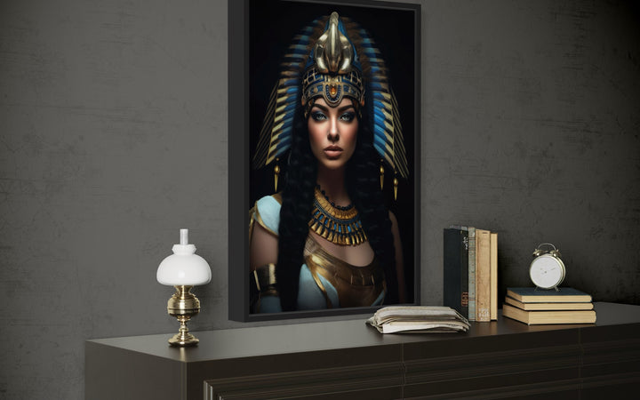Cleopatra framed canvas wall art featuring a regal portrait in gold and blue on a dark background.