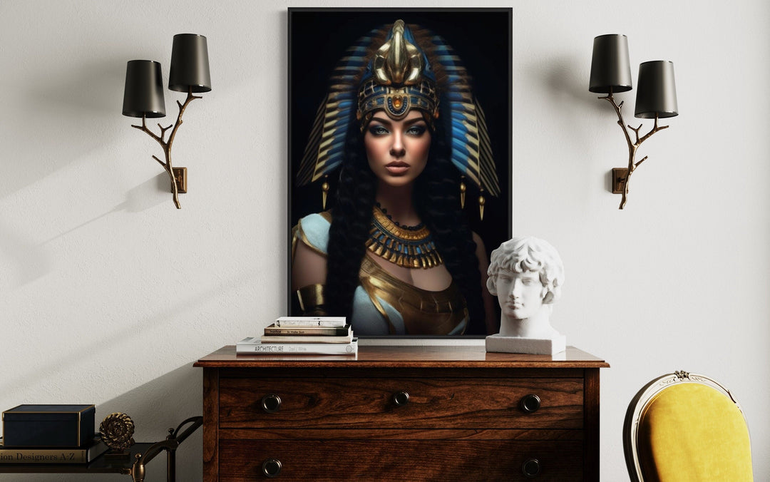 Cleopatra framed canvas wall art above a wooden dresser, flanked by two branch-style wall sconces.