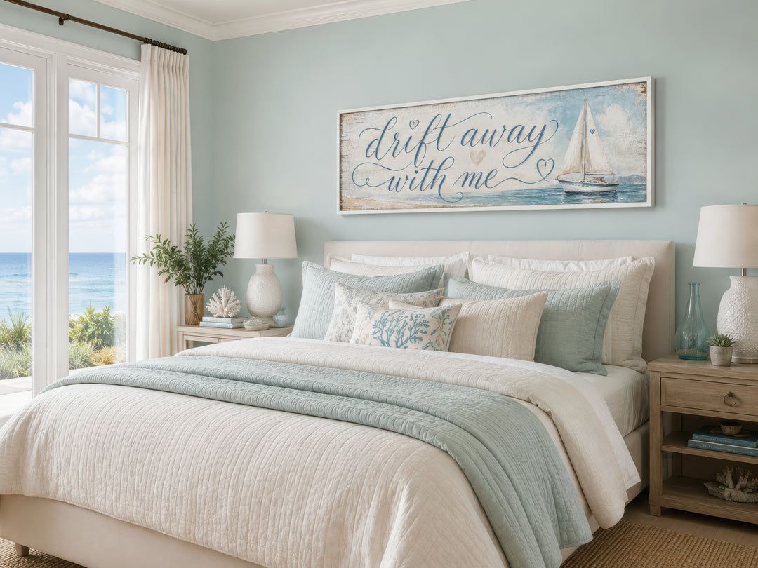 Coastal bedroom wall art featuring a sailboat and 'Drift Away With Me' text on light blue canvas.