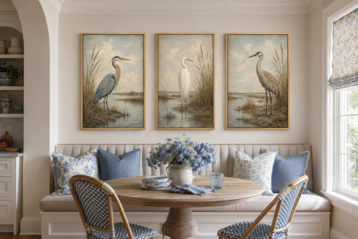 Set of three vintage-style canvas prints featuring a heron, egret, and crane in a marsh setting.
