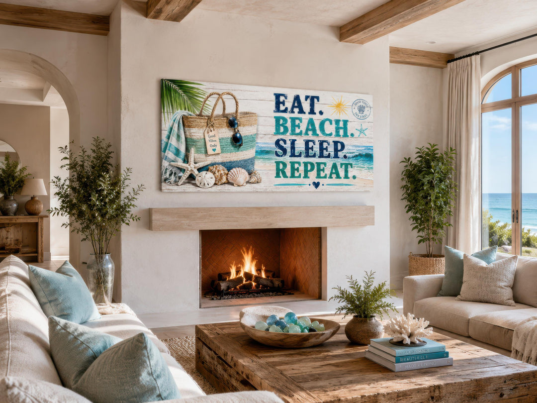 Coastal wall art canvas with "Eat. Beach. Sleep. Repeat." text above a fireplace in a beach house.