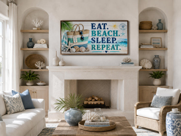 Coastal wall art with 'Eat. Beach. Sleep. Repeat.' text above a fireplace in a beach house living room.