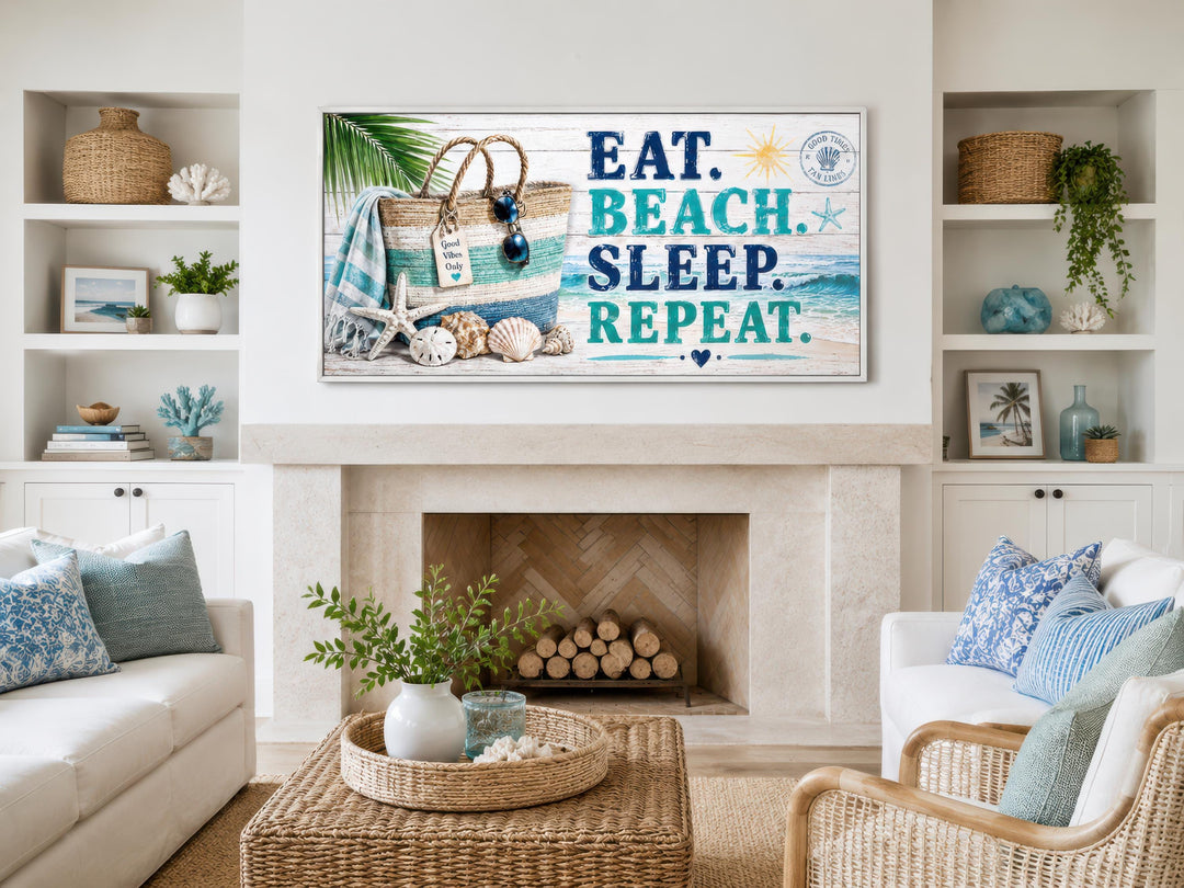 Eat Beach Sleep Repeat canvas print above a fireplace in a bright, coastal-style living room.