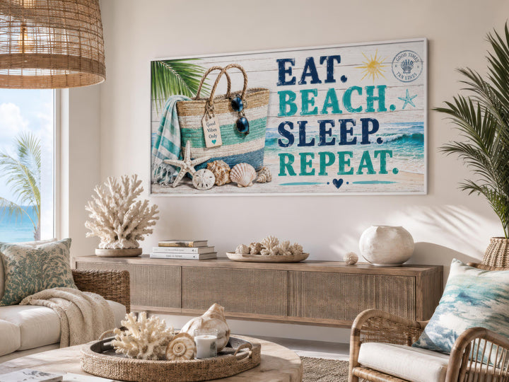 Coastal wall art canvas with 'Eat. Beach. Sleep. Repeat.' text and beach bag illustration.