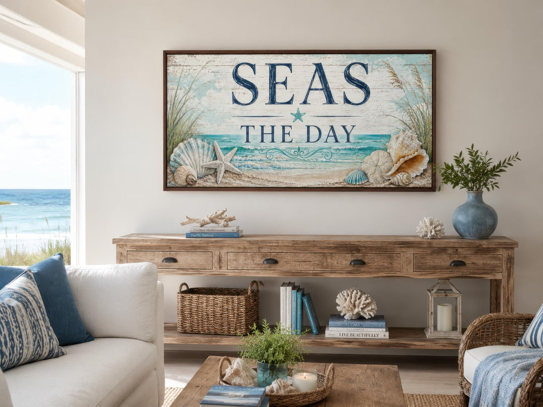 Coastal wall art with "Seas the Day" text, starfish, and seashells above a wooden console table.